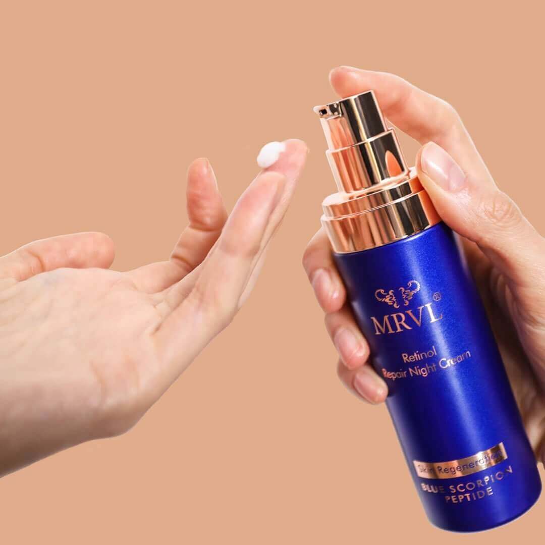 Hands pumping MRVL serum onto fingers